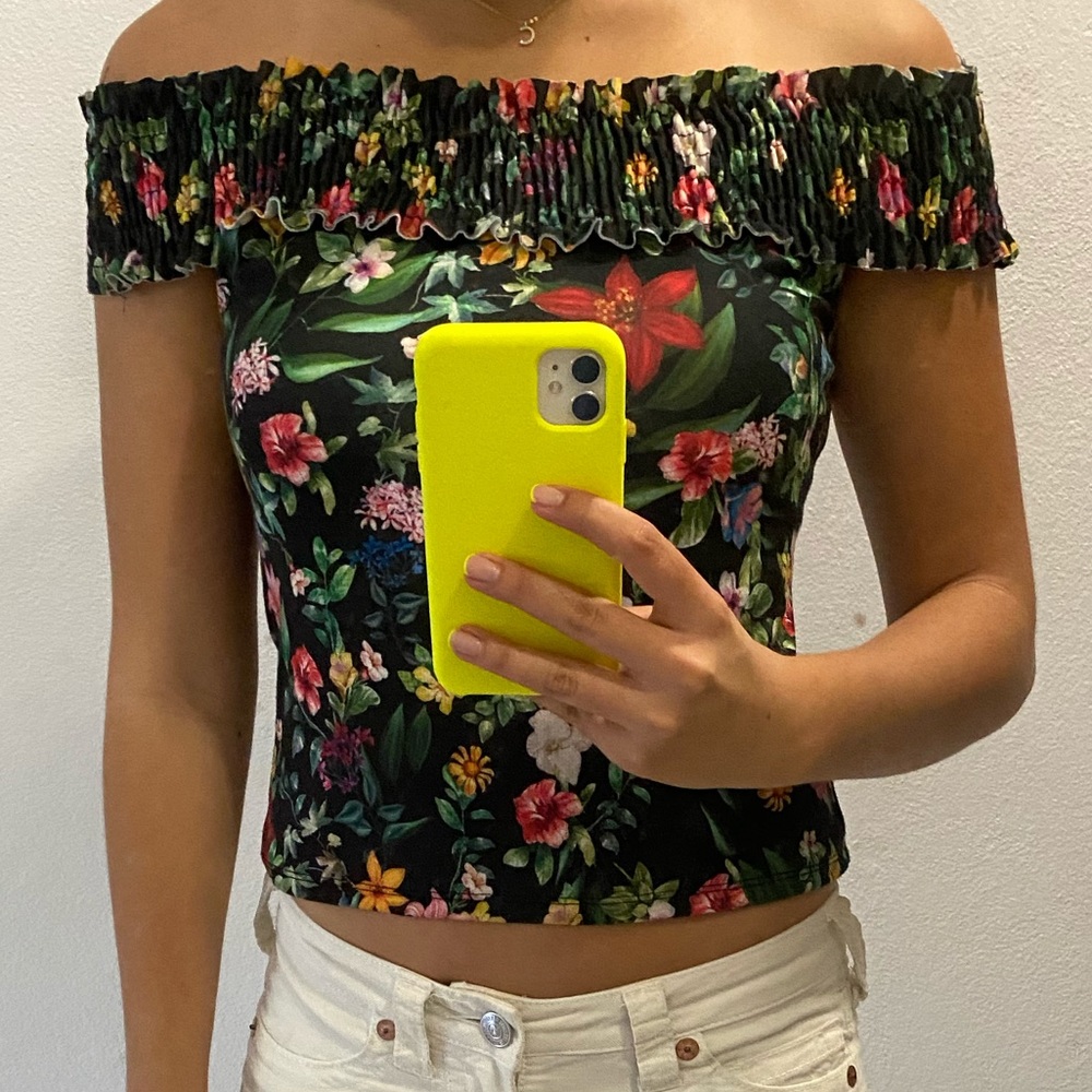 Beautiful black off the shoulder shirt with flower